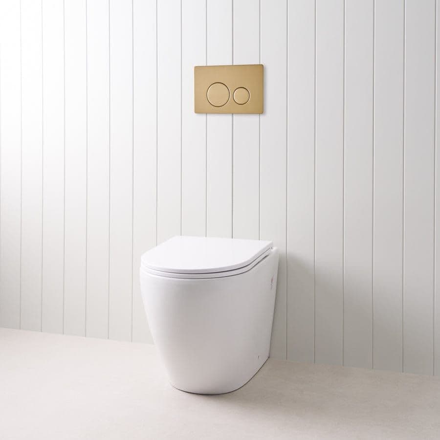 Curved In-Wall Toilet With Round Warm Brushed Nickel Buttons