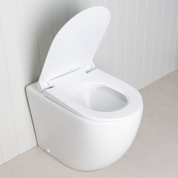 Curved In-Wall Toilet With Rectangle Gunmetal Buttons