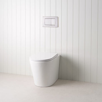 Angled In-Wall Toilet With Rectangle Chrome Buttons