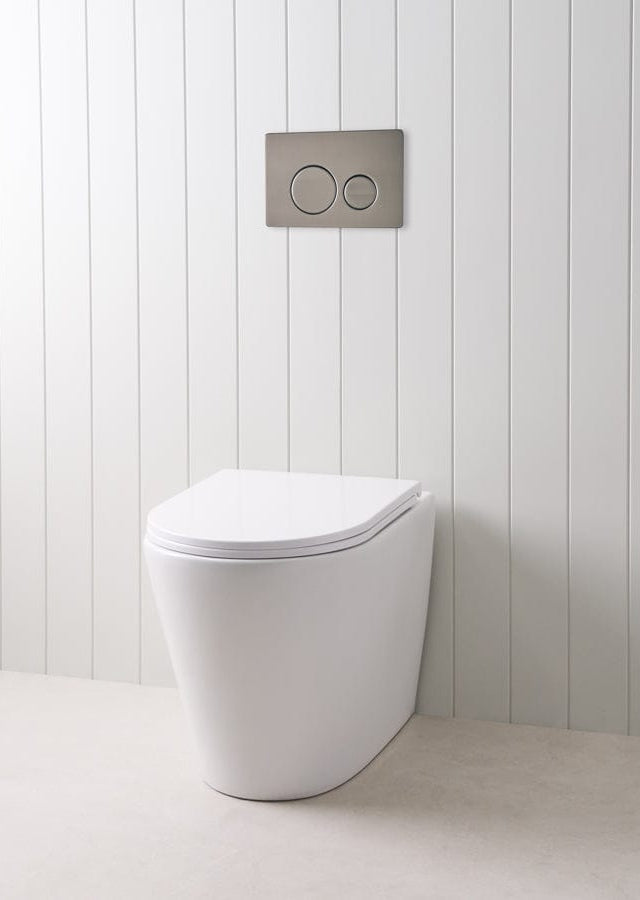 TileCloud TOILETS Angled In-Wall Toilet With Round Gunmetal Buttons