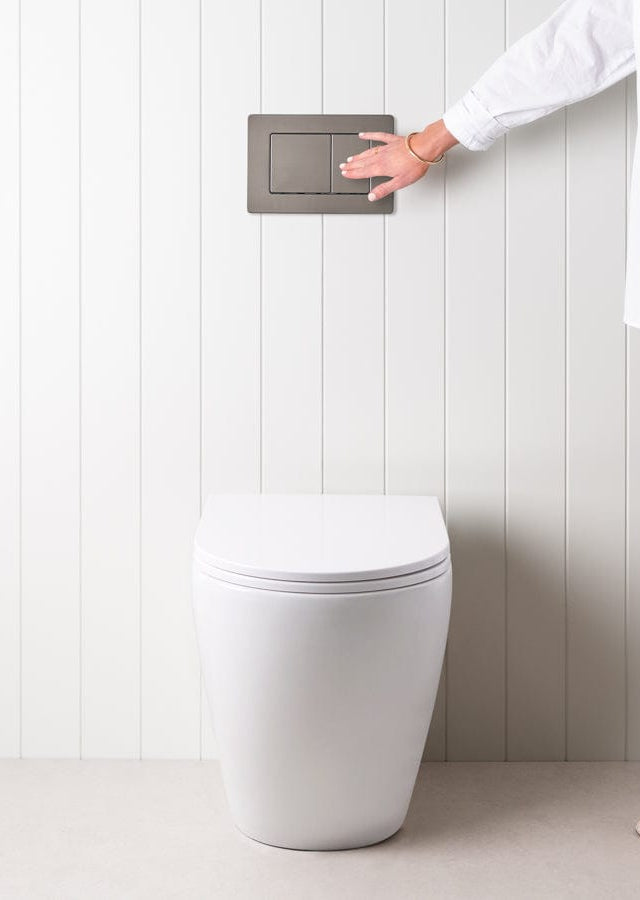 TileCloud TOILETS Curved In-Wall Toilet With Rectangle Gunmetal Buttons