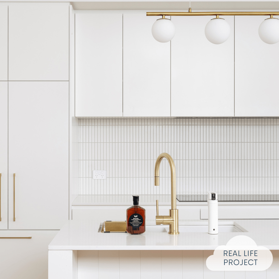 kitchen featuring white tiles as the splashback